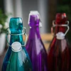 Bottiglia di vetro 1 L con chiusura ermetica - in vari colori - 6 