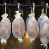 Rete per salumi bianca con dimensioni di 12,5 cm x 5 m, con resistenza termica fino a 220°C - 11 