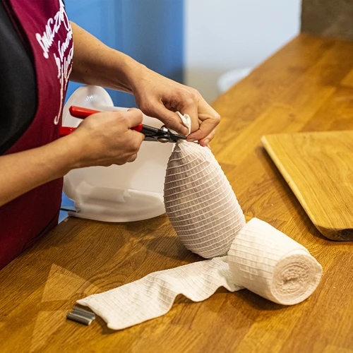 Rete per salumi bianca di dimensioni 12,5 cm x 5 m, con resistenza termica fino a 220°C - 5