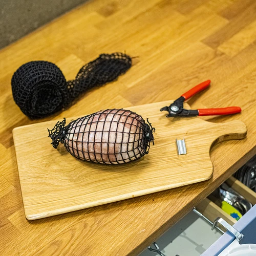Rete per salumi nera di dimensioni 18 cm x 5 m, con resistenza termica fino a 220°C - 5