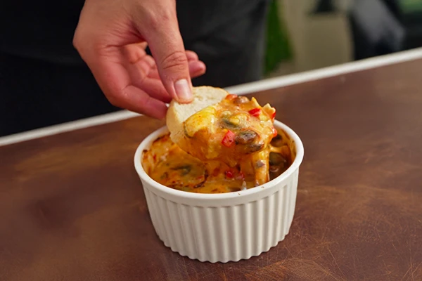 Camembert filante con confettura di pesche